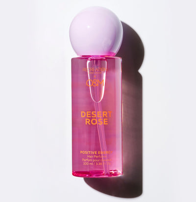 Desert Rose Hair Perfume by Recreation Beauty x O&M — pink-hued glass bottle with spray atomiser, limited edition collab