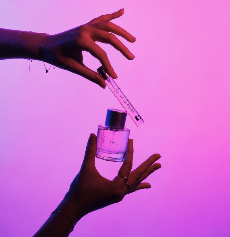 Close-up of L’Hotel eau de parfum packaging with warm vanilla amber scent profile